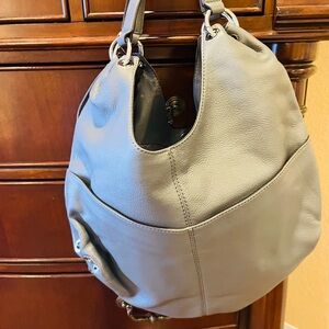 beautiful modern and elegant sophisticated bag color gray real leather!!!